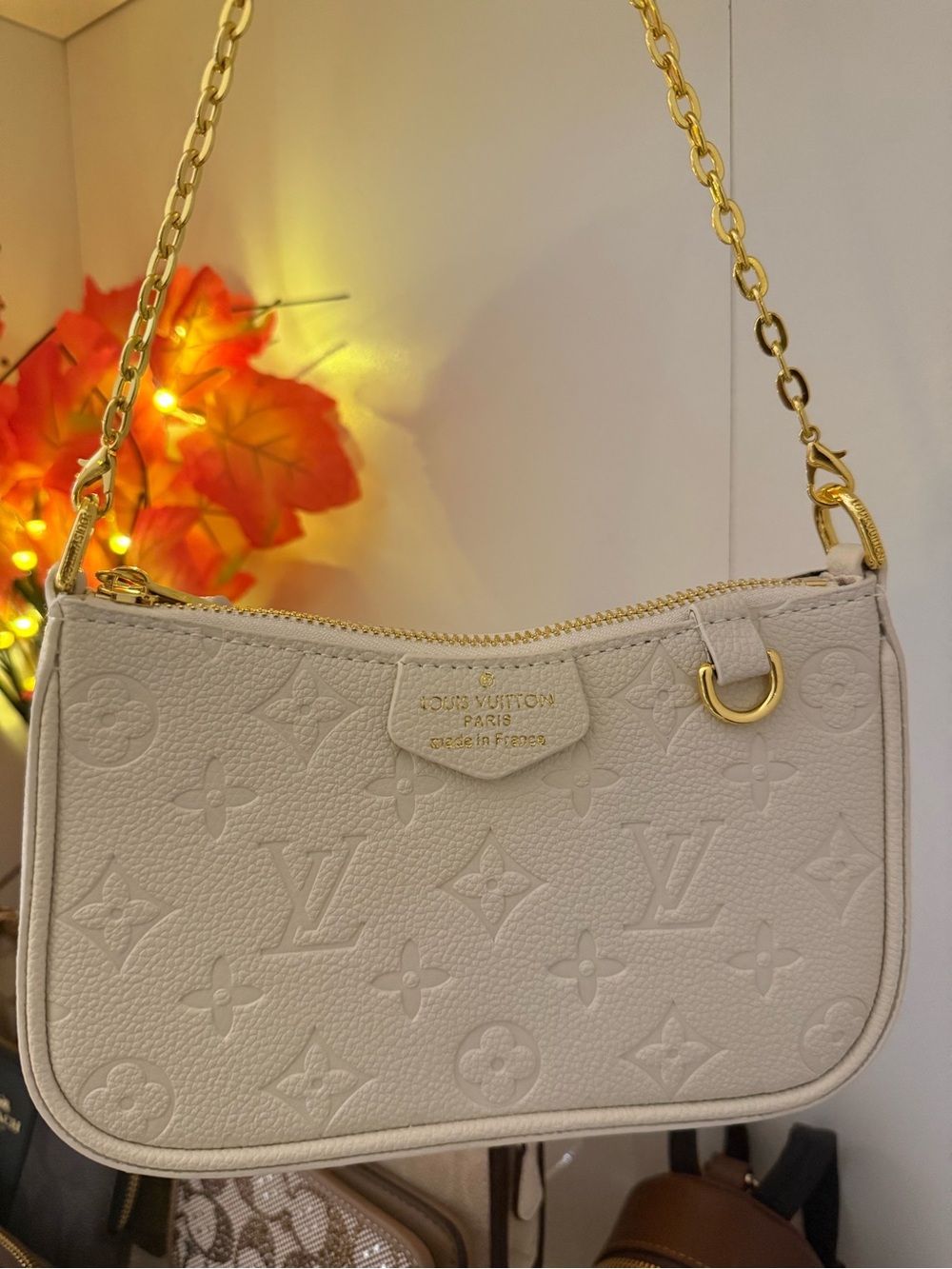 Cream Embossed Shoulder Bag with Gold Chain Strap